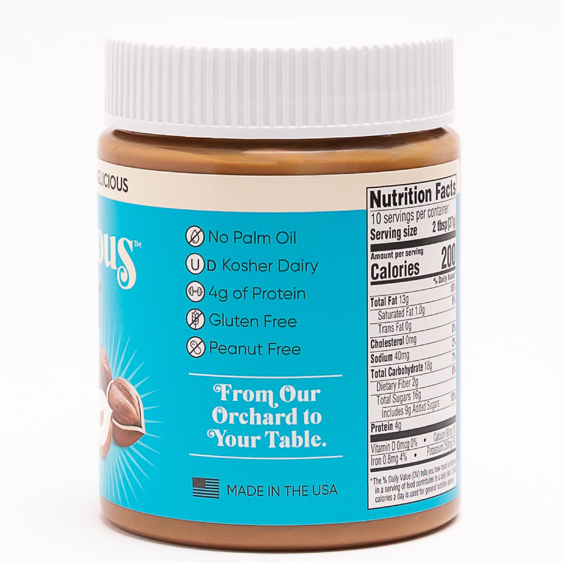 Side view of Nutlicious Hazelnut Butter Spread jar showing nutrition facts and product highlights: No Palm Oil, Kosher Dairy, 4g Protein, Gluten Free, Peanut Free, with "From Our Orchard to Your Table" tagline and Made in the USA label.