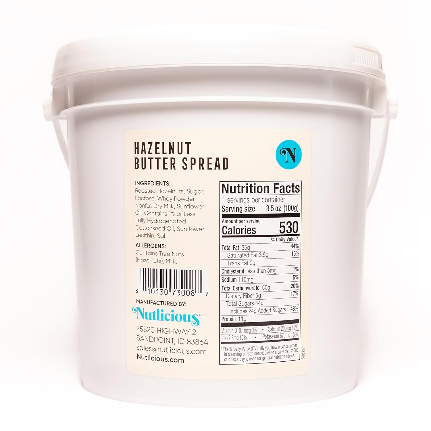 Back view of Nutlicious Hazelnut Butter Spread 9 lb bucket showing nutrition facts, ingredient list, and allergen information.