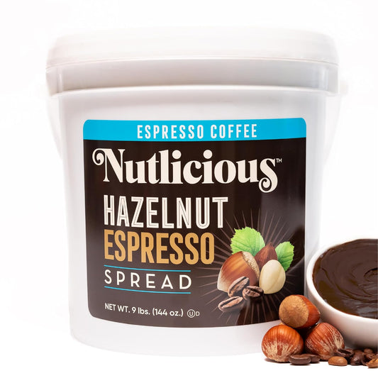 Nutlicious Hazelnut Espresso Spread in 9 lb (144 oz) bulk tub, made with Oregon hazelnuts and roasted espresso coffee, displayed with whole hazelnuts, coffee beans, and a bowl of creamy spread.