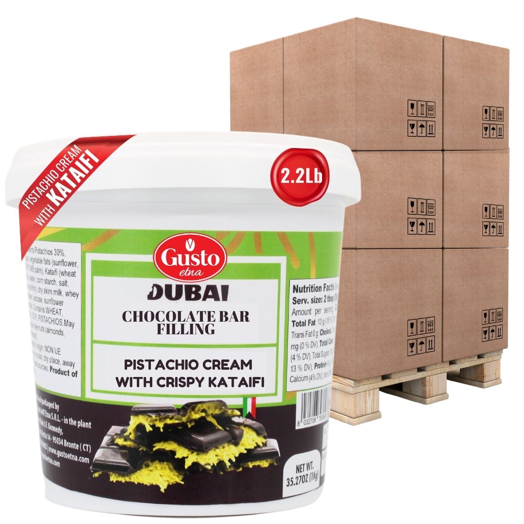 Gusto Etna Dubai Chocolate Bar Filling – 2.2 lb tub of pistachio cream with crispy kataifi, displayed in front of stacked shipping boxes.