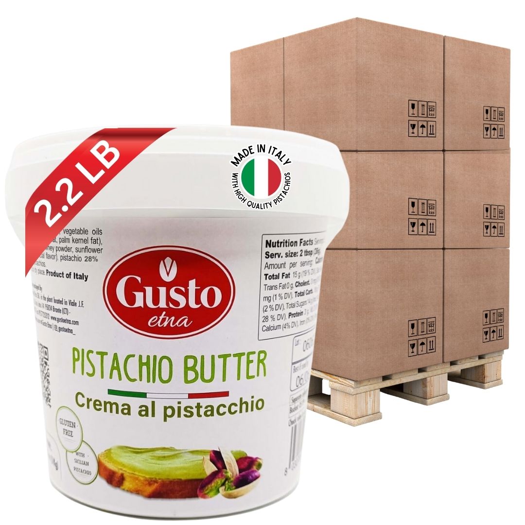 Gusto Etna Pistachio Butter – 2.2 lb tub of creamy pistachio spread, gluten-free, made in Italy with high-quality pistachios, displayed in front of stacked shipping boxes