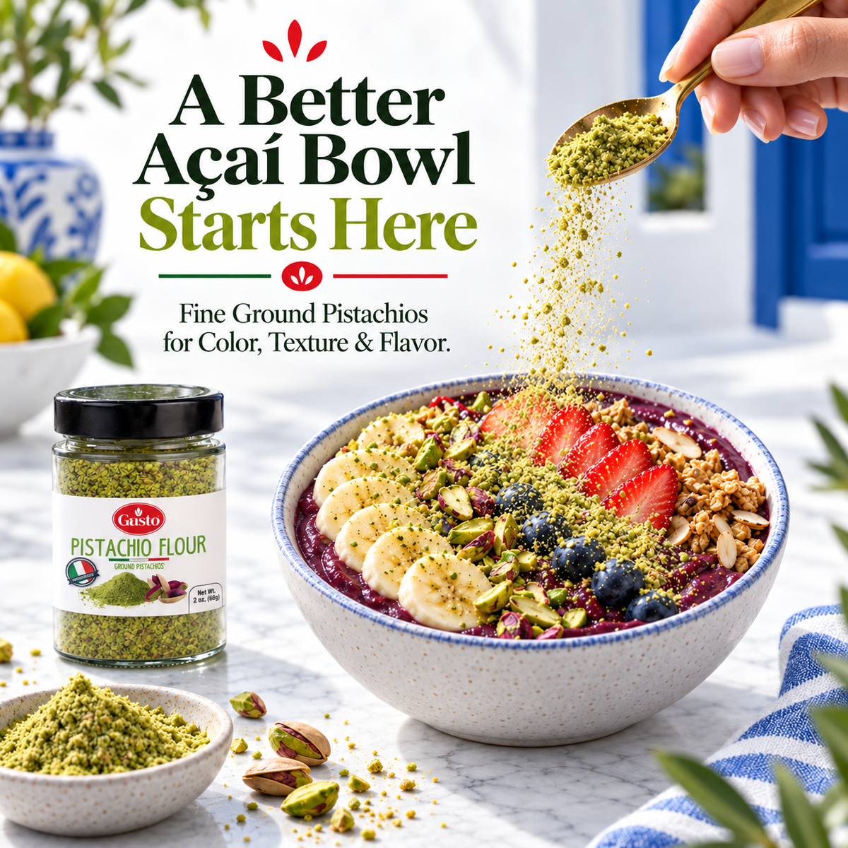 A jar of Lelio Pistachio Flour is shown beside a prepared açaí bowl topped with sliced bananas, strawberries, blueberries, and ground pistachio, with a hand sprinkling more pistachio flour over the bowl. Large promotional text reads 'A Better Açai Bowl Starts Here' and 'Fine Ground Pistachios for Color, Texture & Flavor.