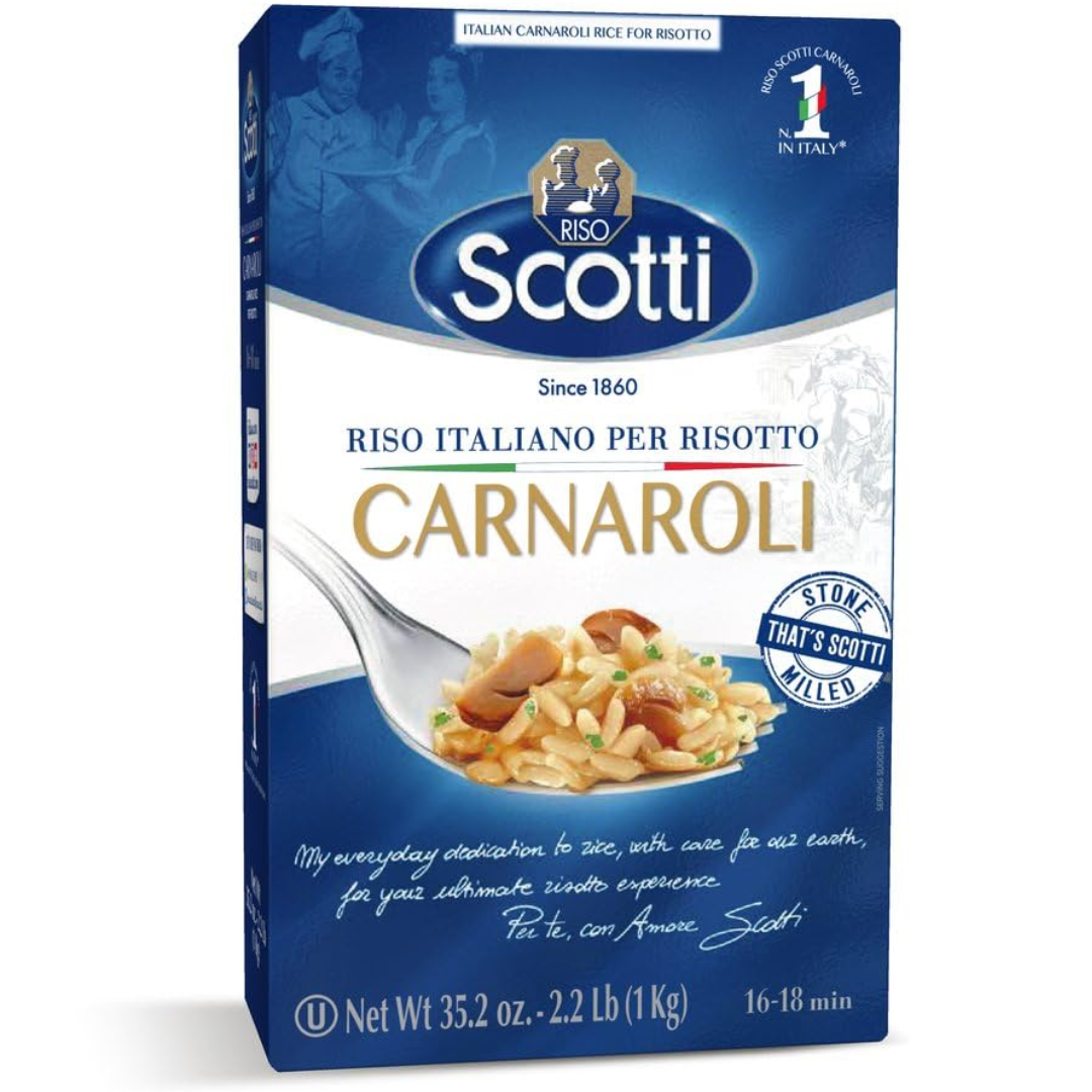 A box of Riso Scotti Carnaroli Rice with a depiction of cooked rice on a fork on the front. The packaging is blue with white and red text detailing the product type and brand.