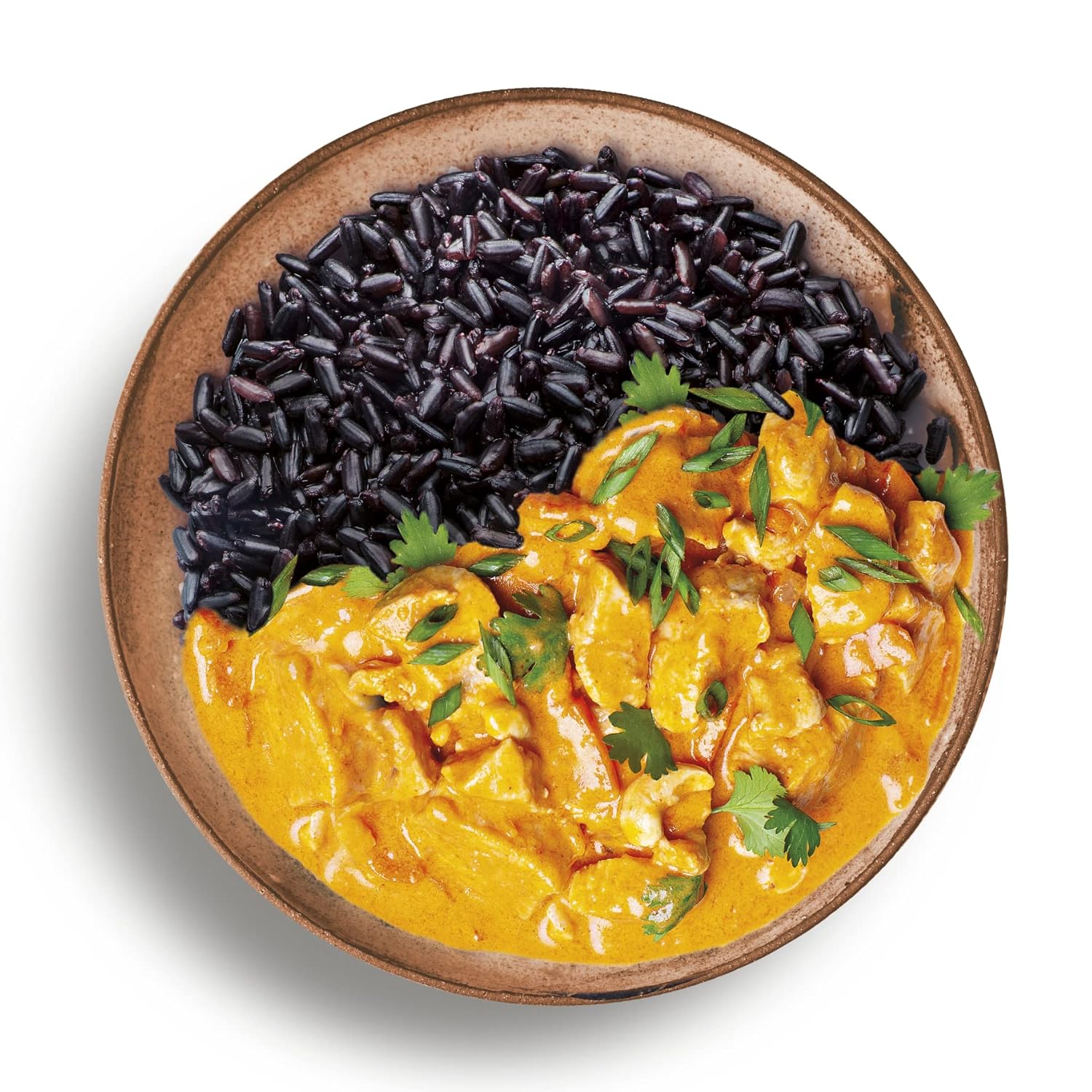 A bowl of cooked Italian Venere black rice served with a creamy golden curry dish, garnished with fresh cilantro and green onions, creating a vibrant and appetizing contrast.
