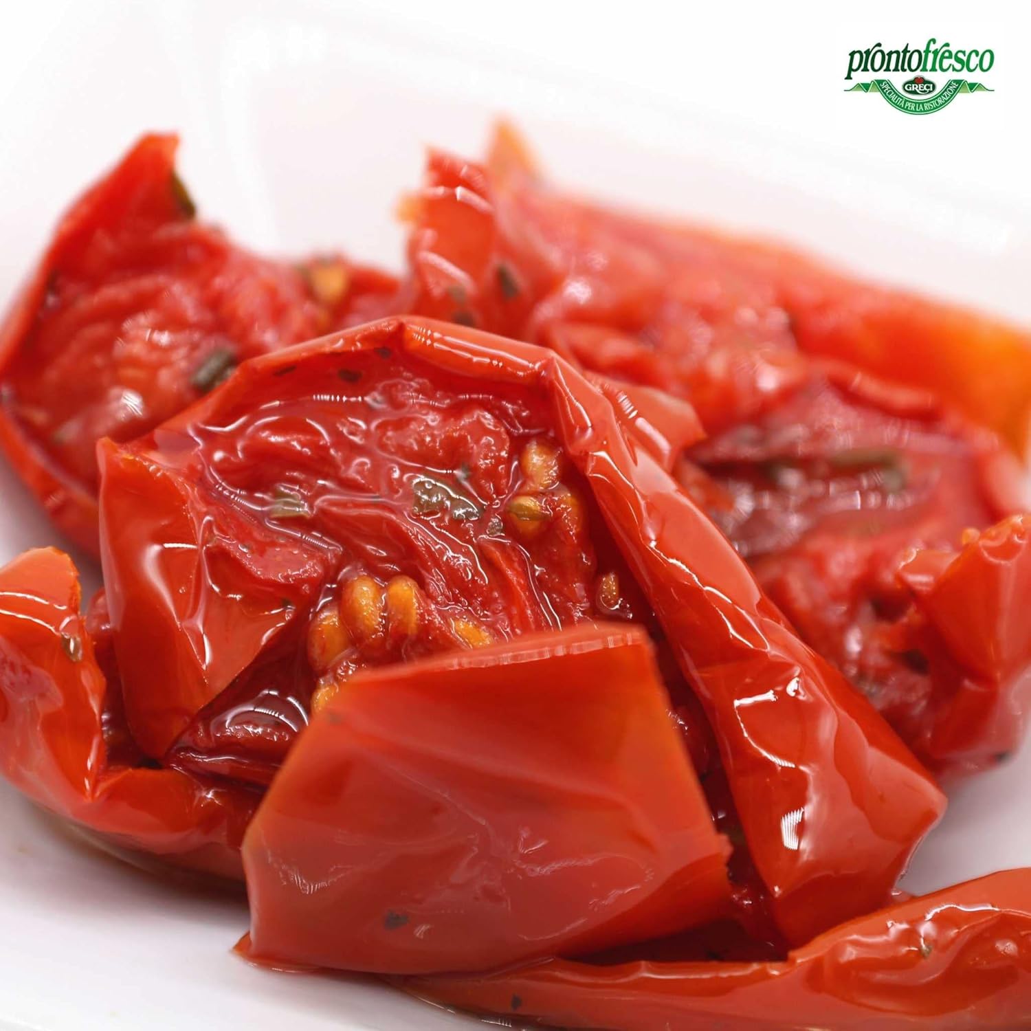 Detailed close-up of semi-dried oven roasted tomatoes preserved in sunflower oil.