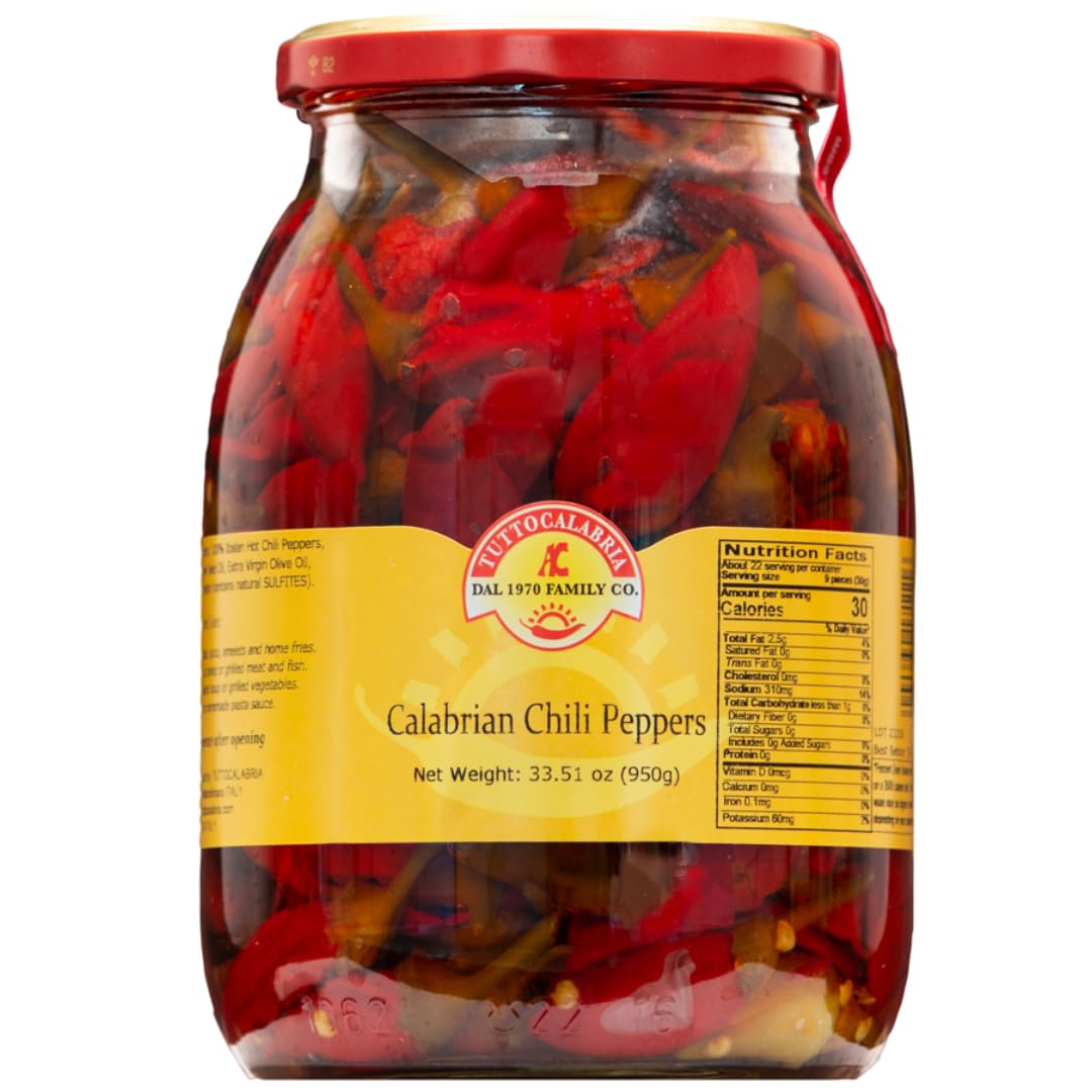 Jar of TuttoCalabria Calabrian chili peppers with a red lid on a white background