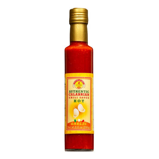 Bottle of Authentic Calabrian Hot Chili Sauce with a gold cap on a white background
