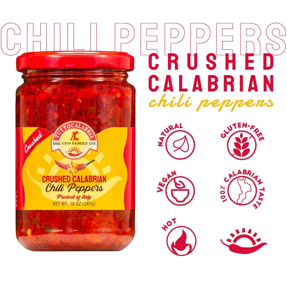 Jar of crushed Calabrian chili peppers with brand logo and product details on a white background