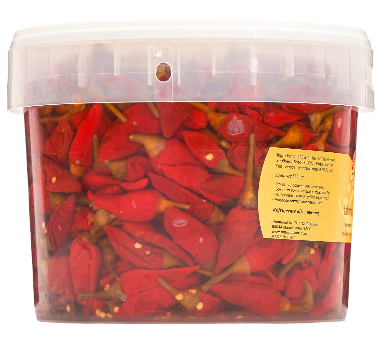 Clear container filled with red chili peppers and a visible label on a white background