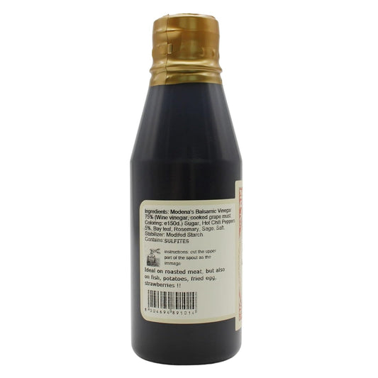 Bottle of balsamic vinegar with a gold cap on a white background