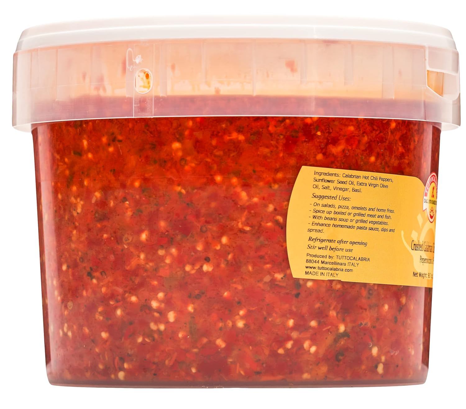 Container of red pepper flakes with a label on a white background