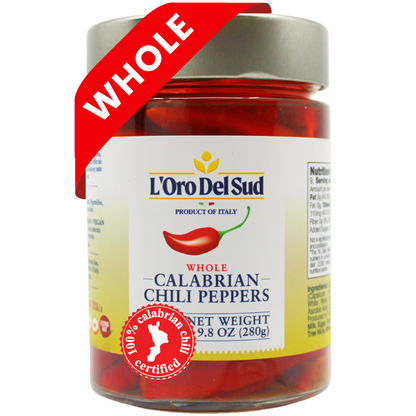 A jar of L'Oro Del Sud Whole Calabrian Chili Peppers. The label shows the product name and an image of the chili peppers.