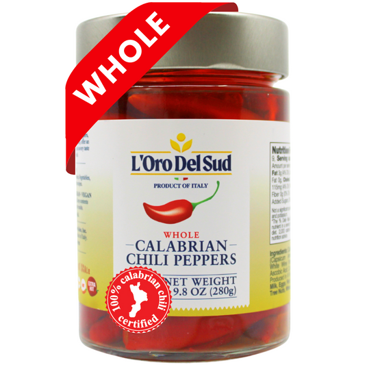A jar of L'Oro Del Sud Whole Calabrian Chili Peppers. The label shows the product name and an image of the chili peppers.