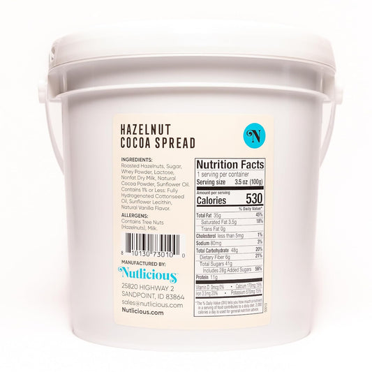 Container of hazelnut cocoa spread with Nutlicious branding and nutrition label.