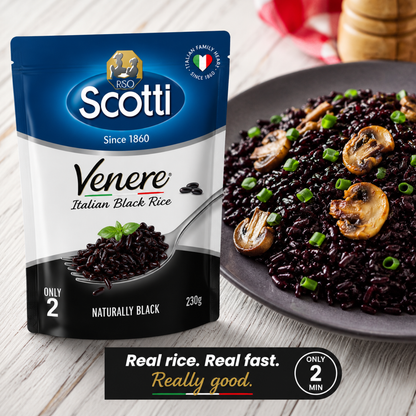 A package of RSO Scotti Venere Italian Black Rice next to a plate of cooked black rice with mushrooms and green onions, on a light wood surface.
