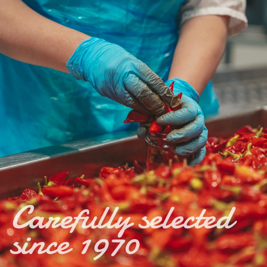 Traditional preparation of Calabrian chili peppers for Tutto Calabria sauces and pastes