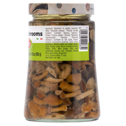 Back label of Fratelli D’Amico Mixed Mushrooms in Oil jar, 24.7 oz (700 g) / drained 17.6 oz (500 g), showing detailed ingredient list including various mushroom varieties (shiitake, porcini, oyster, etc.), sunflower oil, garlic, parsley, and seasonings.