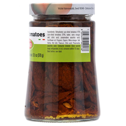 Fratelli D’Amico Sun-Dried Tomatoes in Oil, glass jar back label showing ingredients list including sun-dried tomatoes (31%), water, wine vinegar, sunflower oil, peppers, capers, herbs, garlic, hot chili, citric acid, and storage instructions